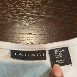 White is pure so be pure with this Tahari shirt.